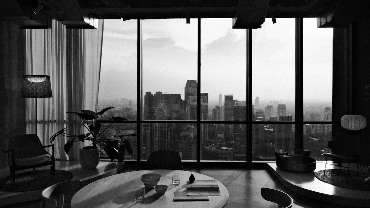 Modern office with daylight from large windows. Photo by David Kristianto on Unsplash
